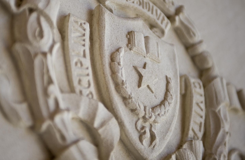 Seal of The University of Texas at Austin in stone