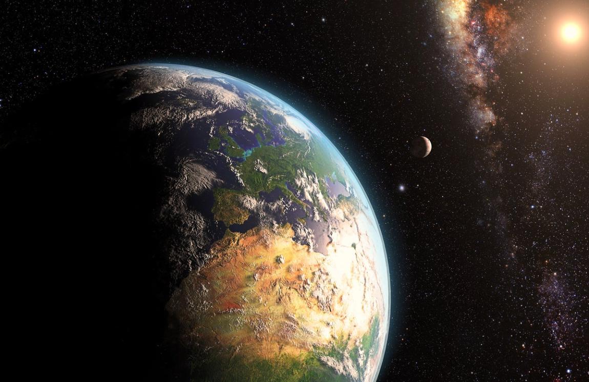 Sunrise over Earth as seen from space with moon and stars in background. Elements of this image furnished by NASA.