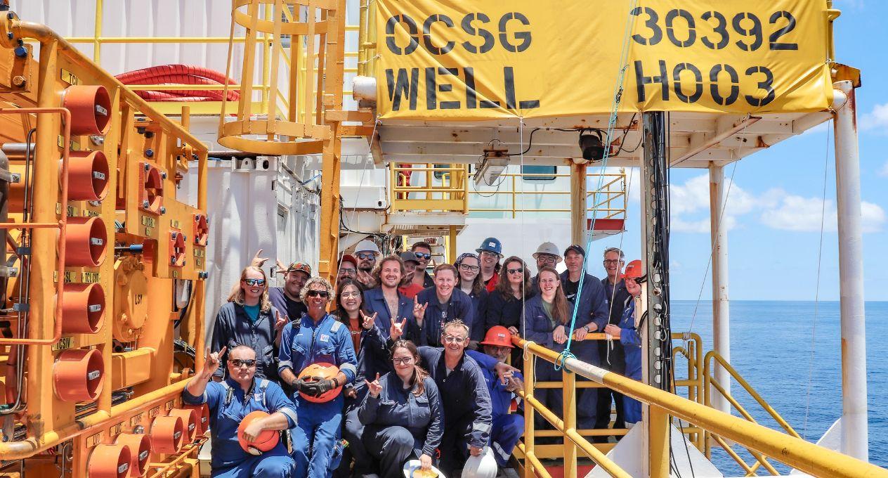 group of people on an ocean oil rig