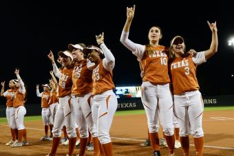 Longhorns baseball payers sing The Eyes of Texas to the crowd after the game
