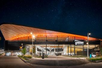Exterior of the Moody Center at night