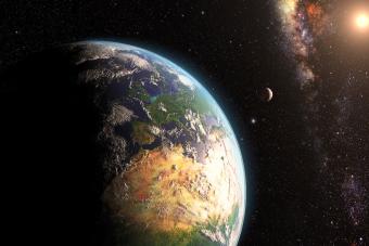 Sunrise over Earth as seen from space with moon and stars in background. Elements of this image furnished by NASA.