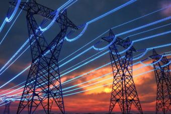 power line towers with glowing lines