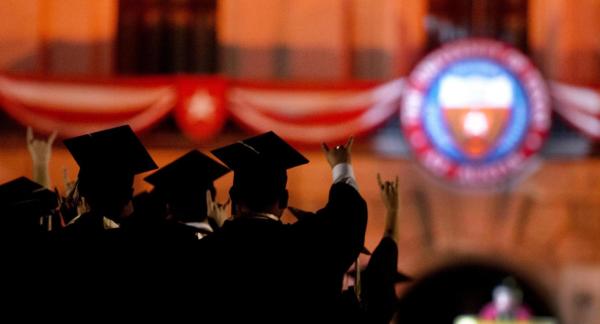 Students in their graduation gowns during Commencement