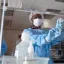 Pharmacist in blue presonal protective equipment