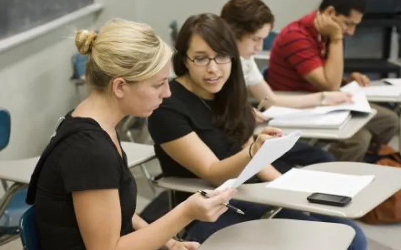 Two students chatting in class