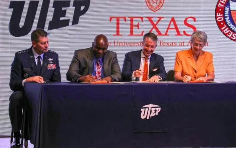 Gen. David D. Thompso, UTEP President Heather Wilson, UT Austin President Jay Hartzell and Archie Holmes Jr. sit at table 